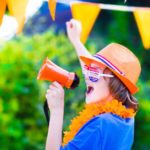 Dutch football fan, little teenager boy cheering